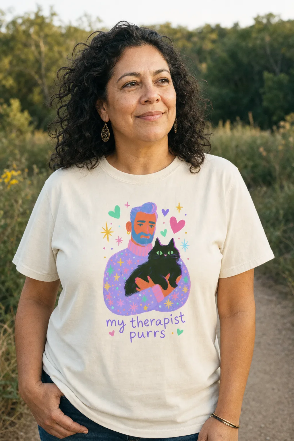 My Therapist Purrs shirt worn outdoors